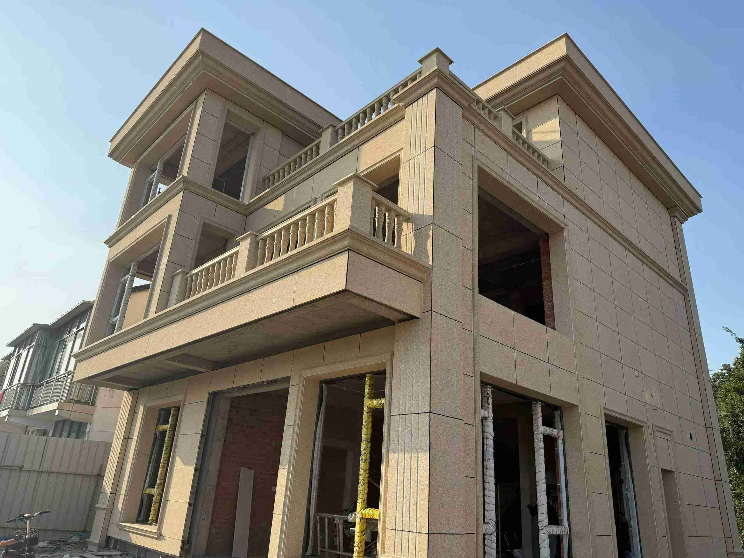 荆州 黄金麻花岗岩石材荔枝面外墙干挂效果展示